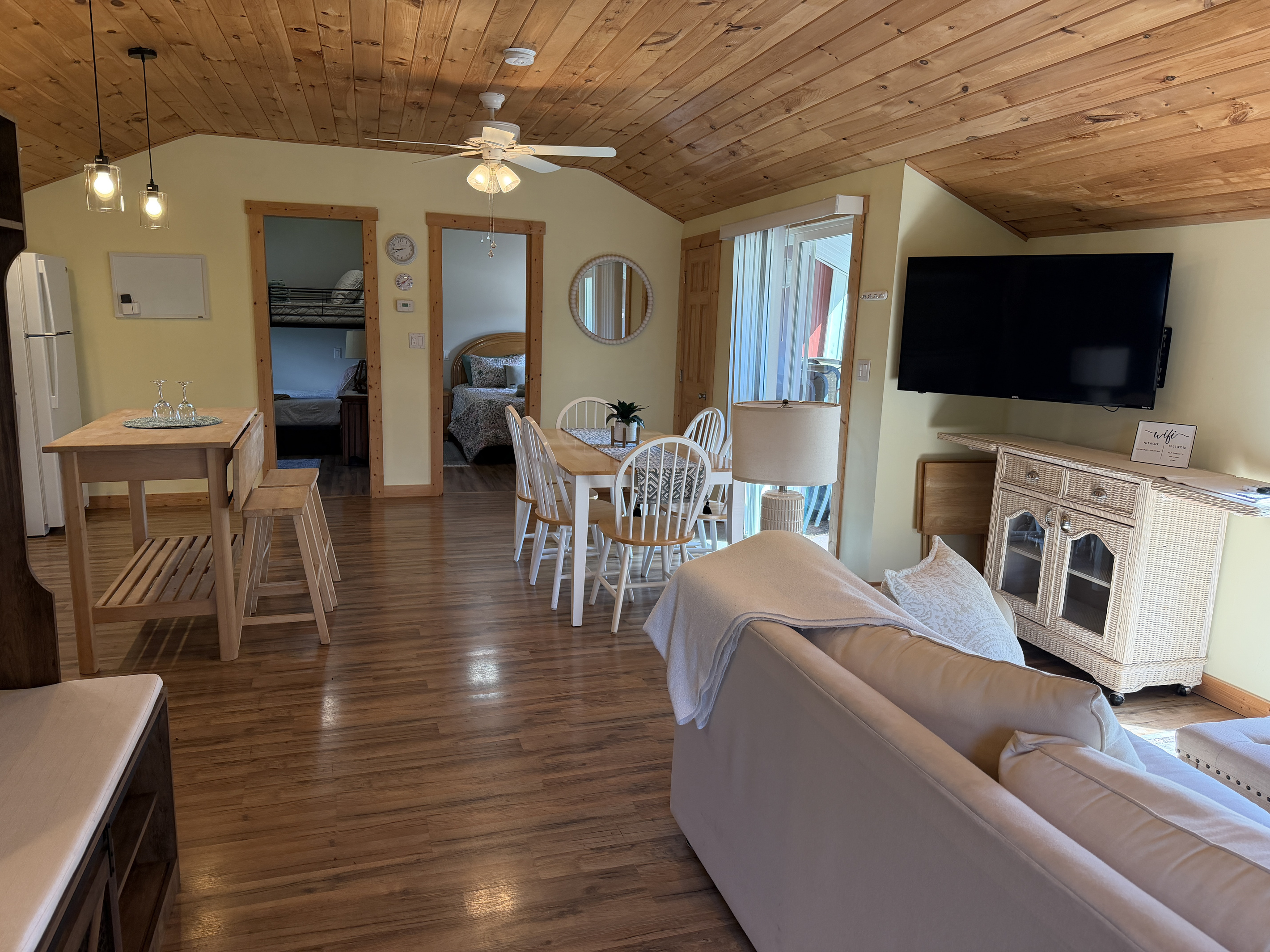 Open concept living, dining and kitchen areas