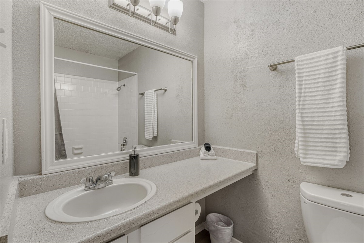 Bright and clean bathroom with a simple, modern design.