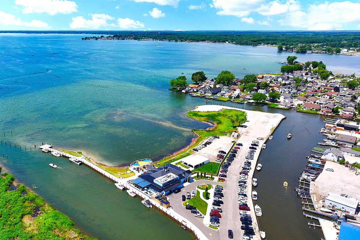 Enjoy the best of Lake St. Clair just outside your door—from the sandy swimming area to Cabana Blue Lakefront Sports Bar & Grill, where waterfront dining, refreshing drinks, and live entertainment are all within a short stroll.