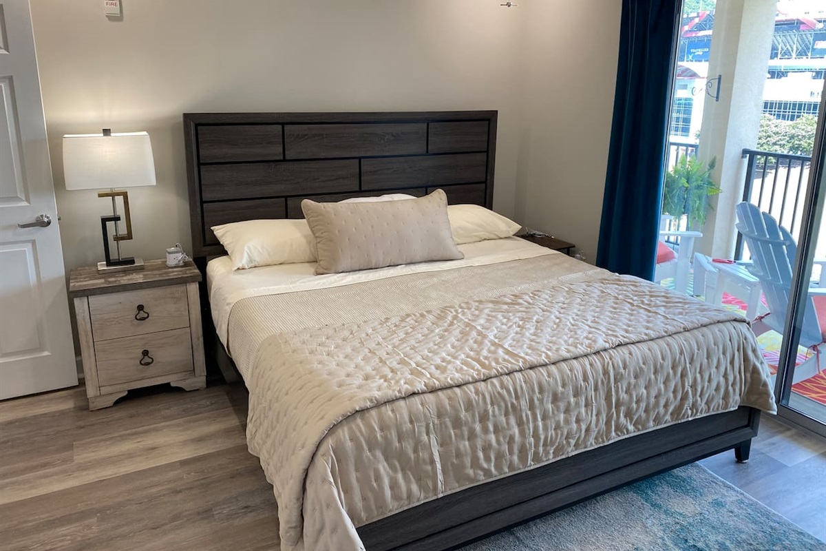 Surprise! This king bedroom suite includes its own panoramic view of the Holston Mountain ridge and the Bristol Motor Speedway.