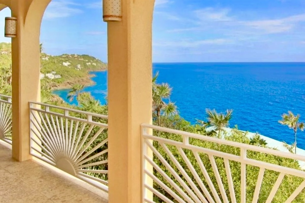 Covered oceanfront veranda with postcard Atlantic views—perfect for coffee, cocktails, and sunrise watching.