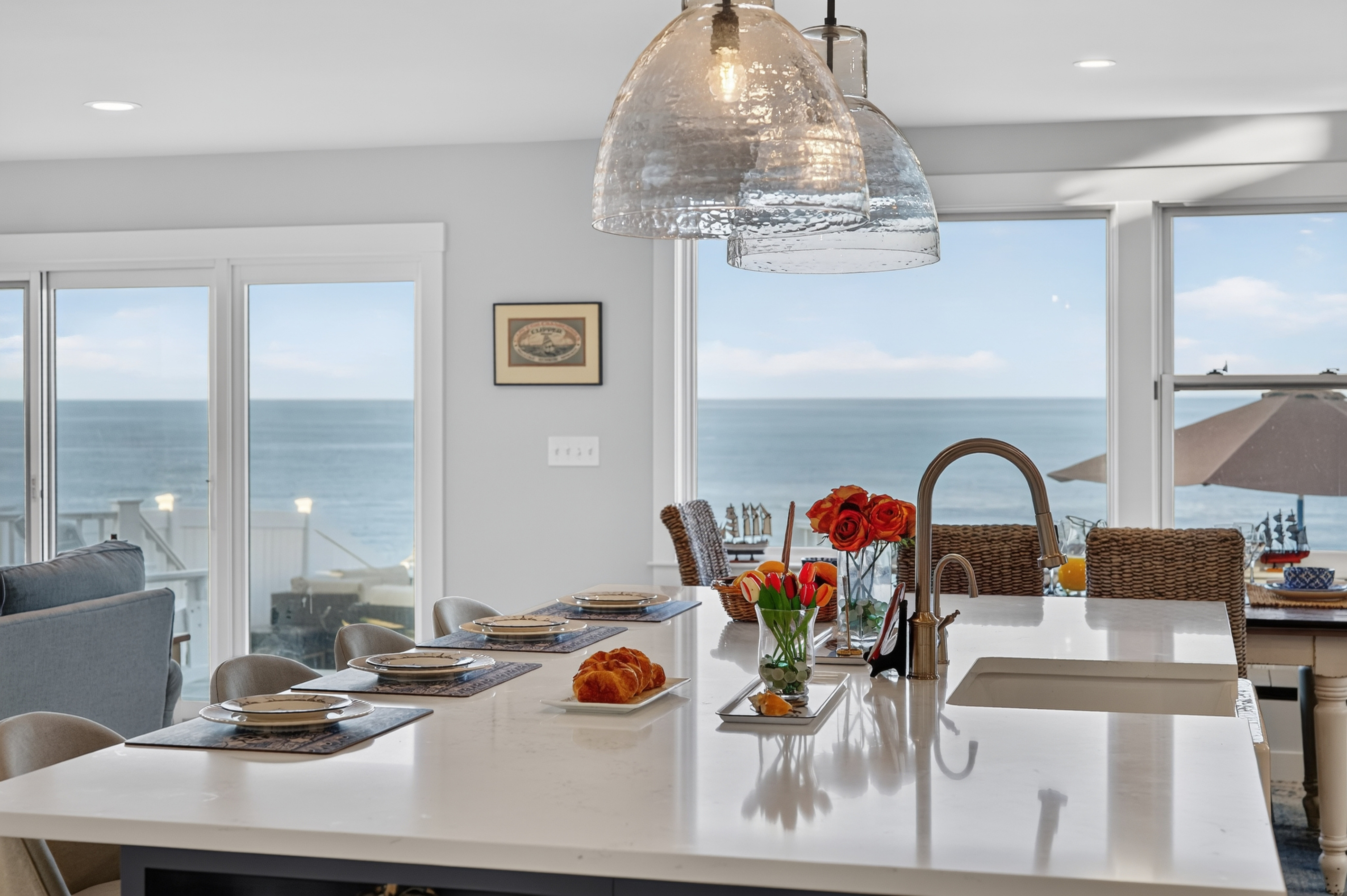 Gourmet kitchen with stunning ocean views and a spacious island for gathering
