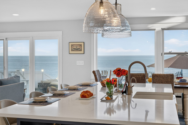 Gourmet kitchen with stunning ocean views and a spacious island for gathering