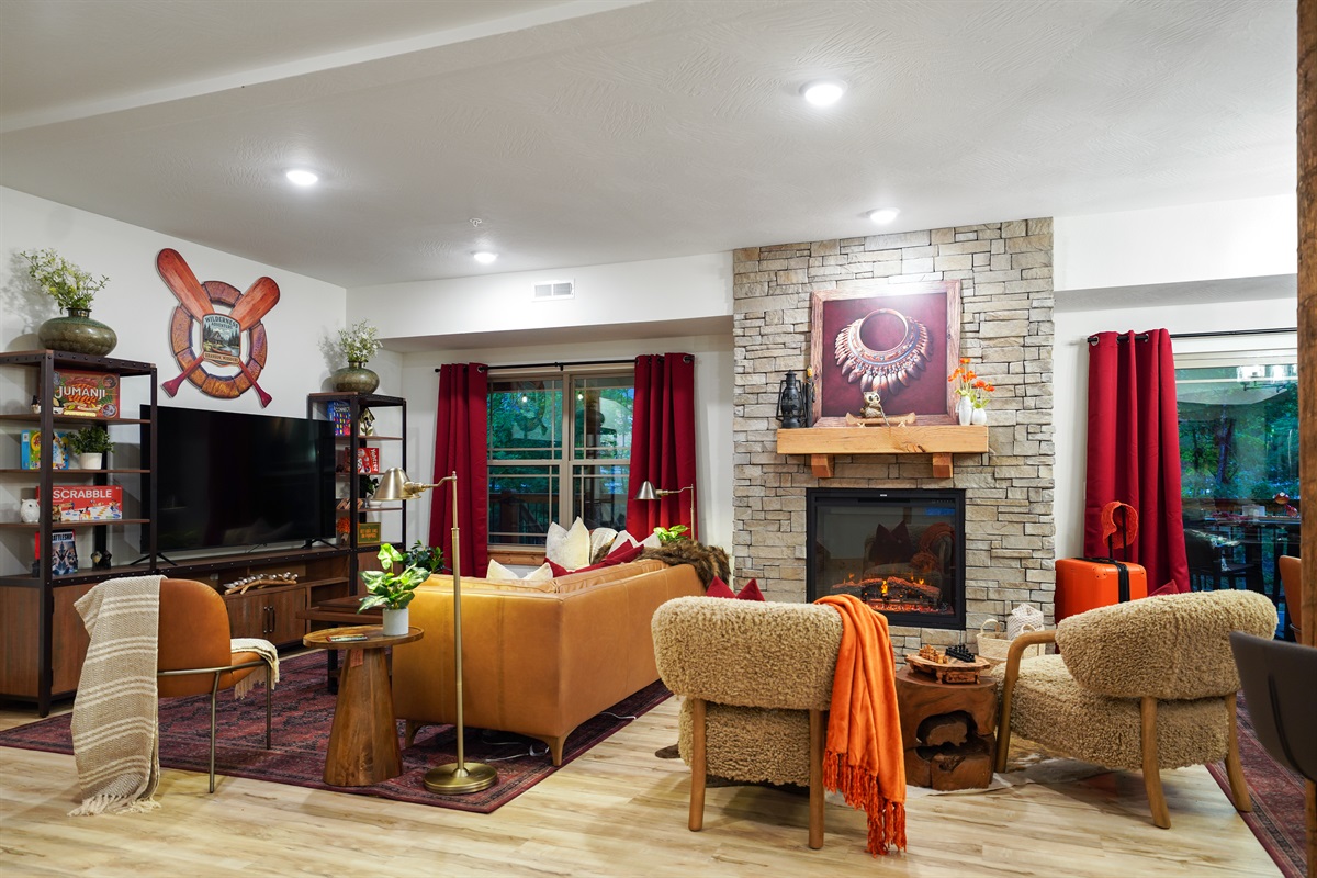 Comfy seating by the fire, TV and Infinity Game table for hours of relaxing and story telling