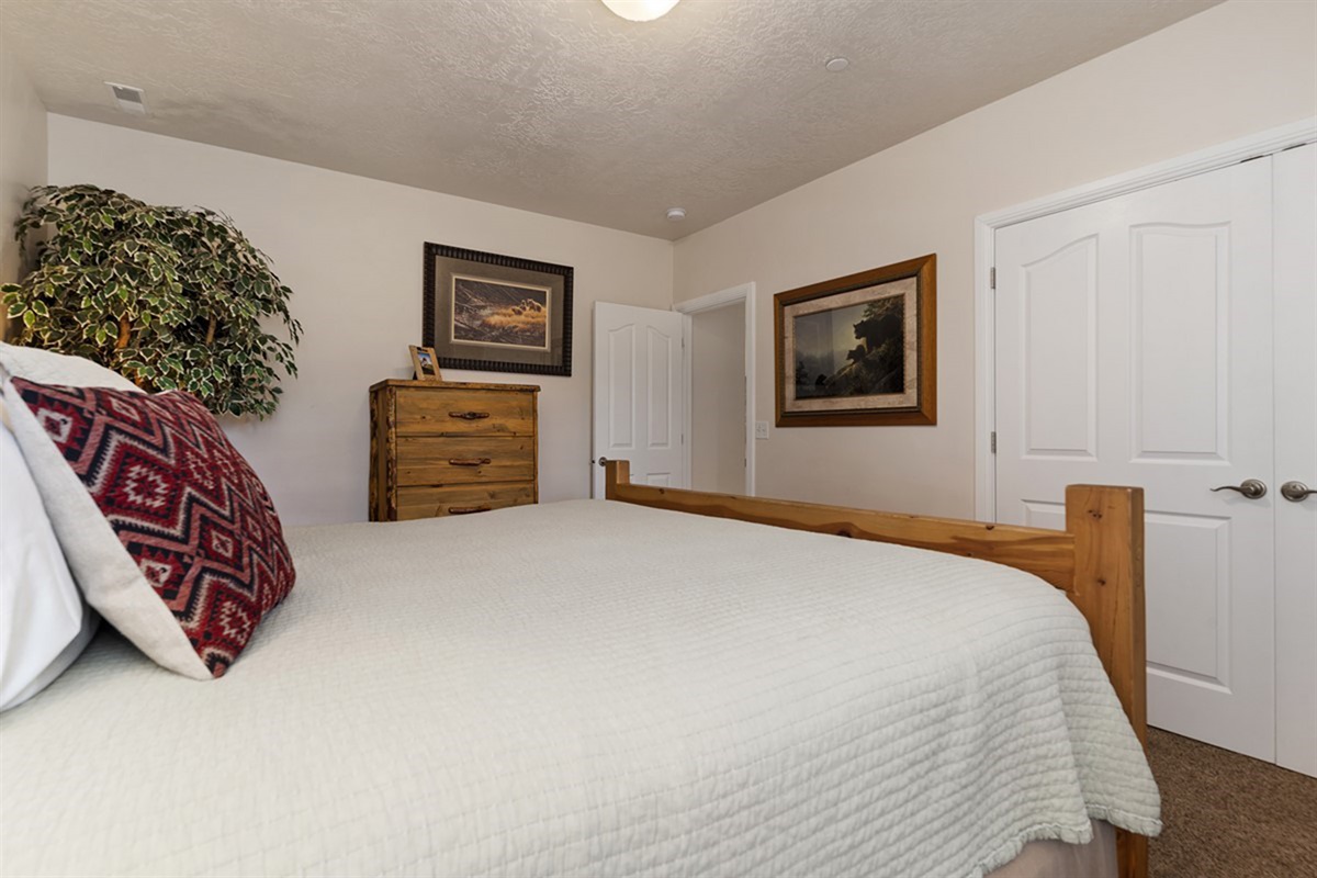 A quiet retreat with warm finishes and relaxing tones.