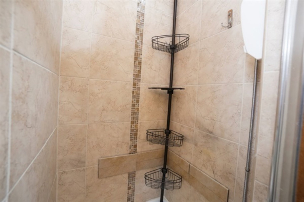 Enjoy a full-sized stand-up shower with exceptional water pressure