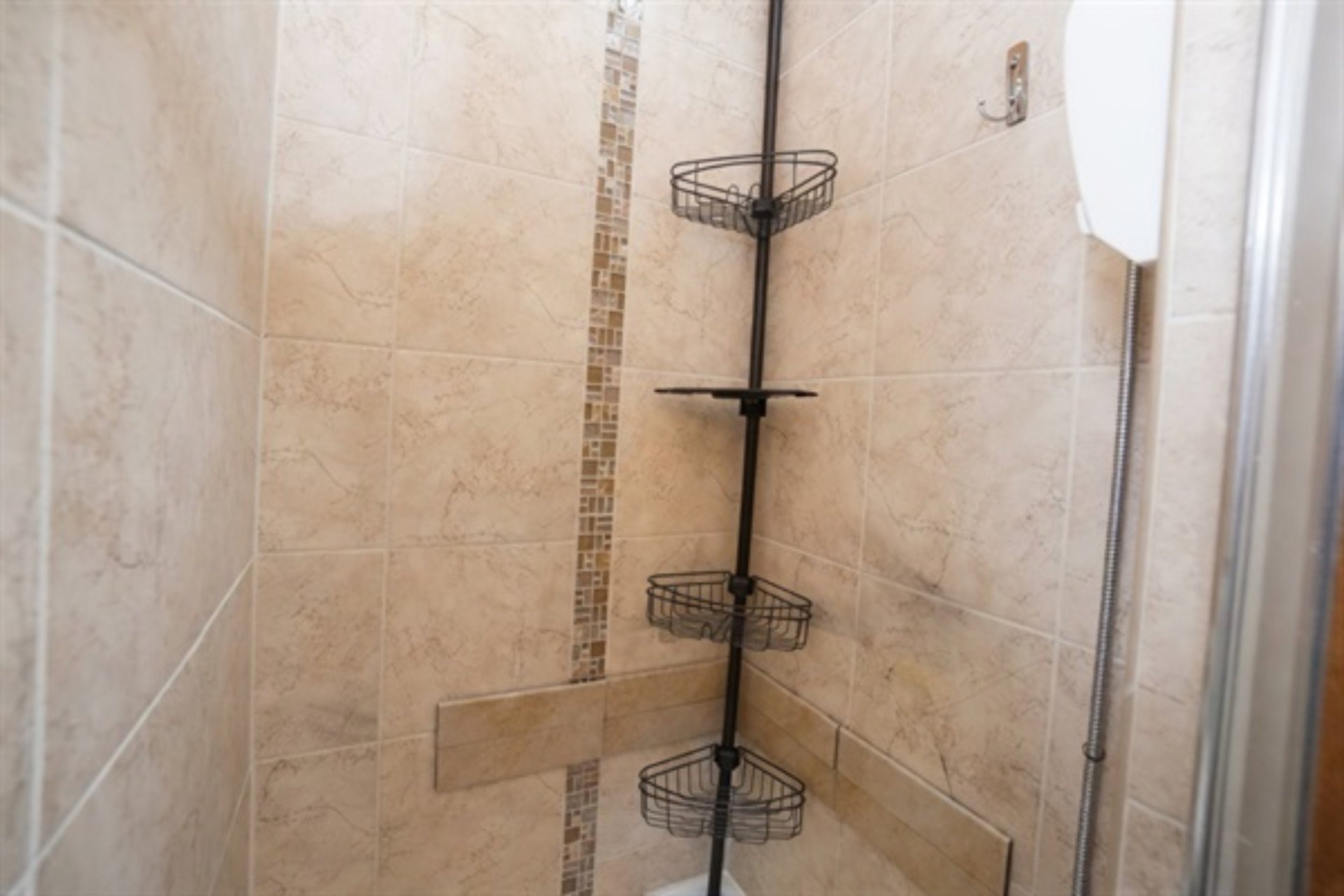 Enjoy a full-sized stand-up shower with exceptional water pressure