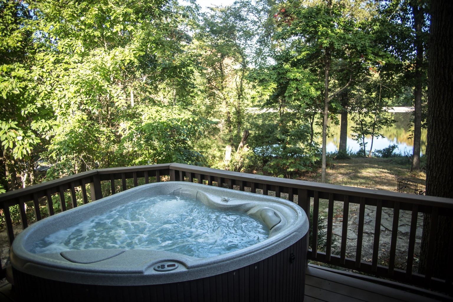 Private hot tub overlooking the 3 acre pond