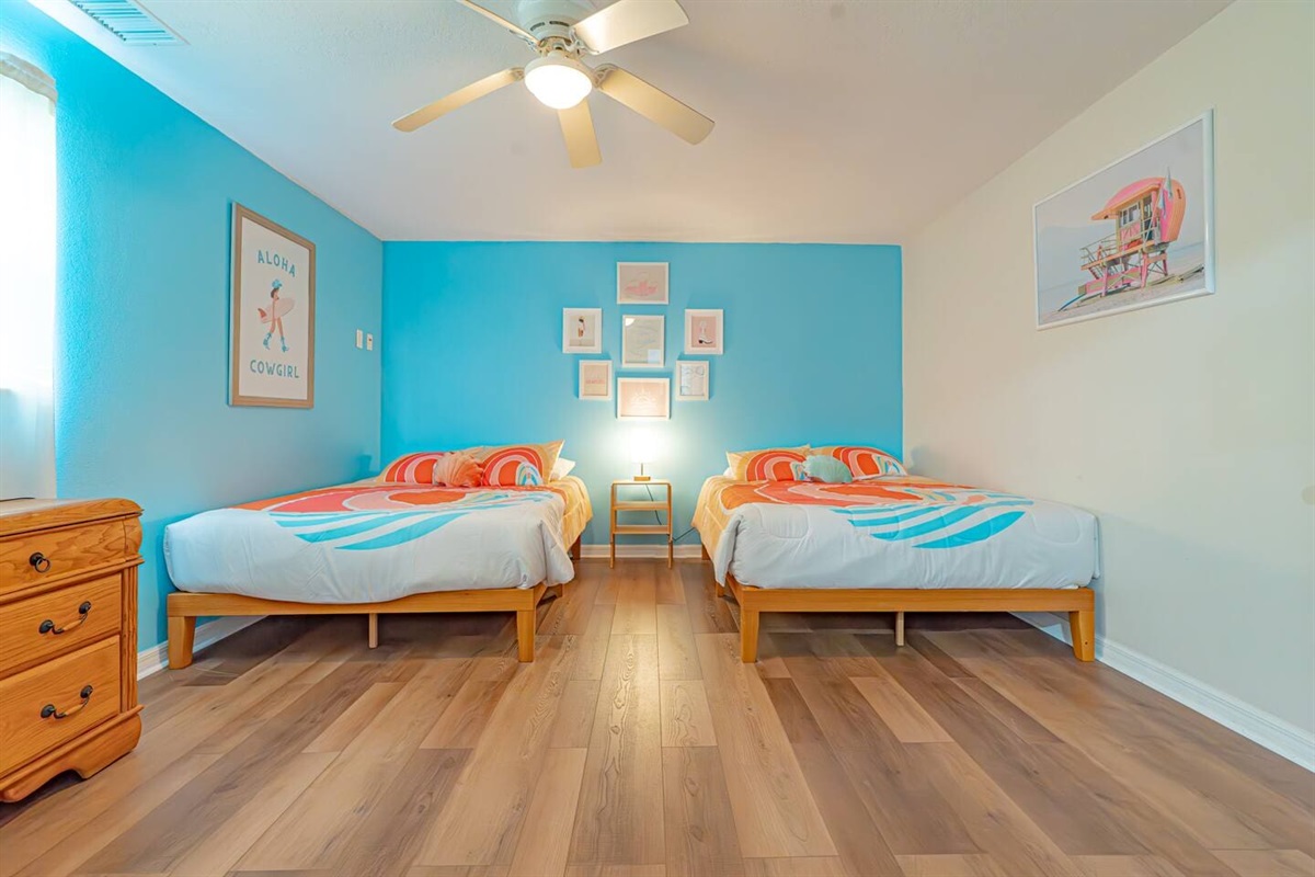 Disco Cowgirl Themed 2-Queen Suite with private bathroom.