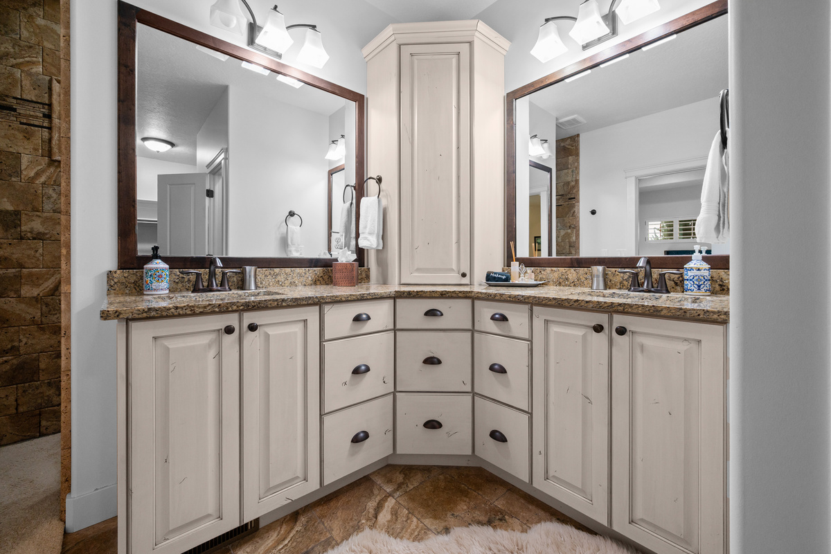 Spa-Inspired Ensuite – Start and end your day in the luxurious ensuite featuring dual vanities, granite countertops, and plenty of space to get ready.