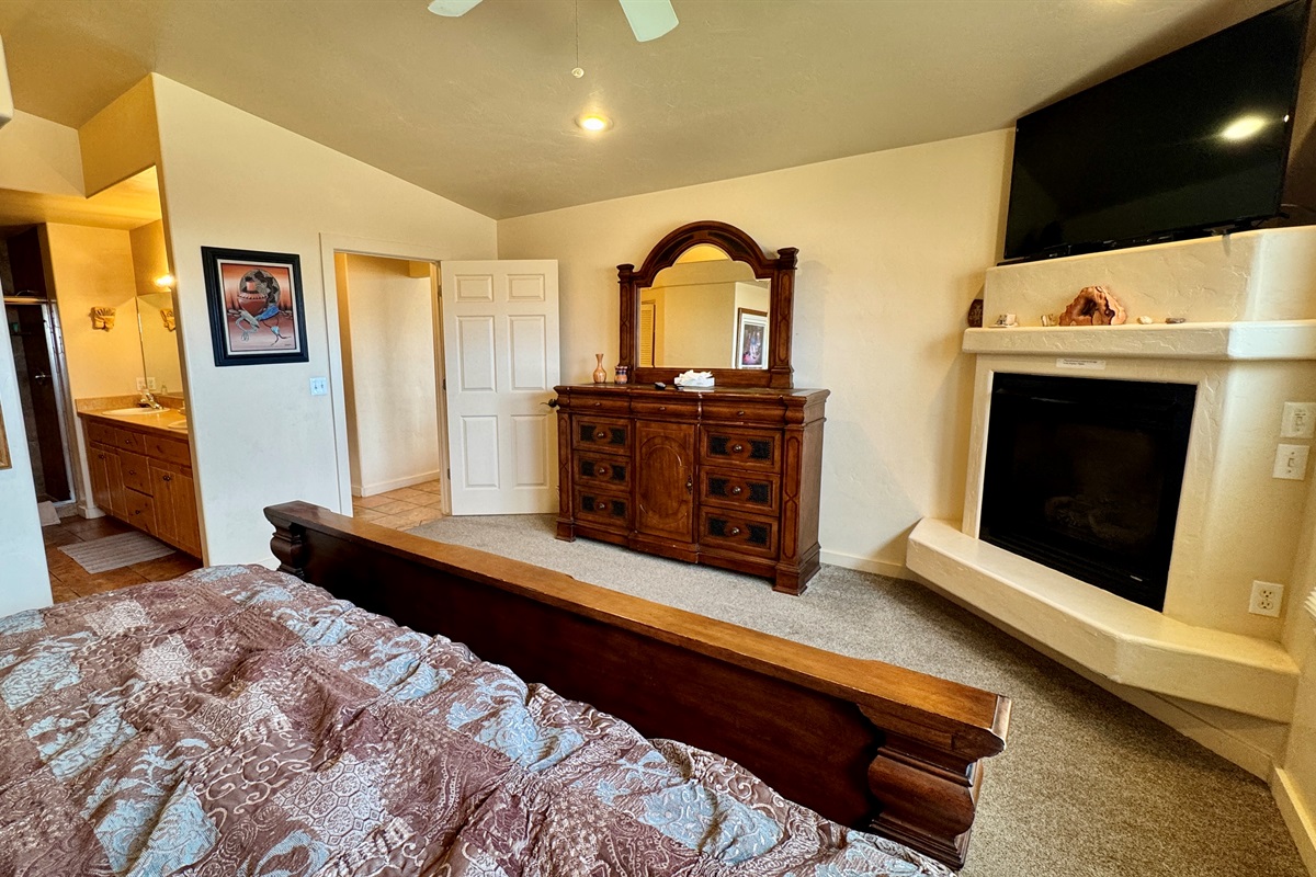 Primary Suite with King Bed and Fireplace