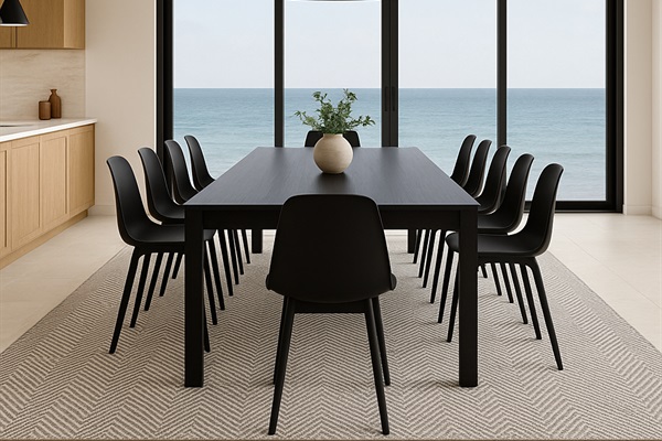 Gather here for long meals, laughter, and stories — just steps from ocean air and water views.