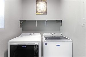 Convenient in-unit laundry room with washer and dryer. Perfect for freshening up after a day of exploring.