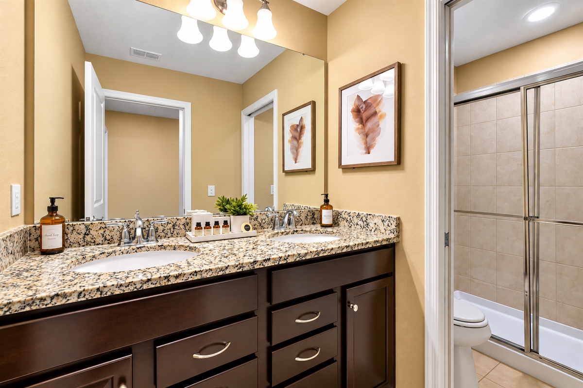 Separate shower and toilet area allow more people to use the facilities at once.