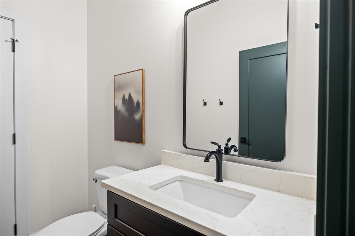 Half bath conveniently near the pool and game room