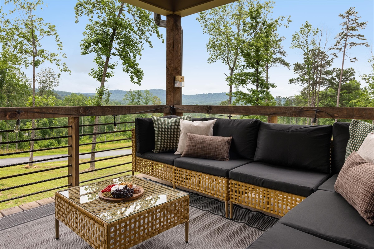 Soft neutrals, natural textures, and serene forest views, outdoor living, thoughtfully elevated.
