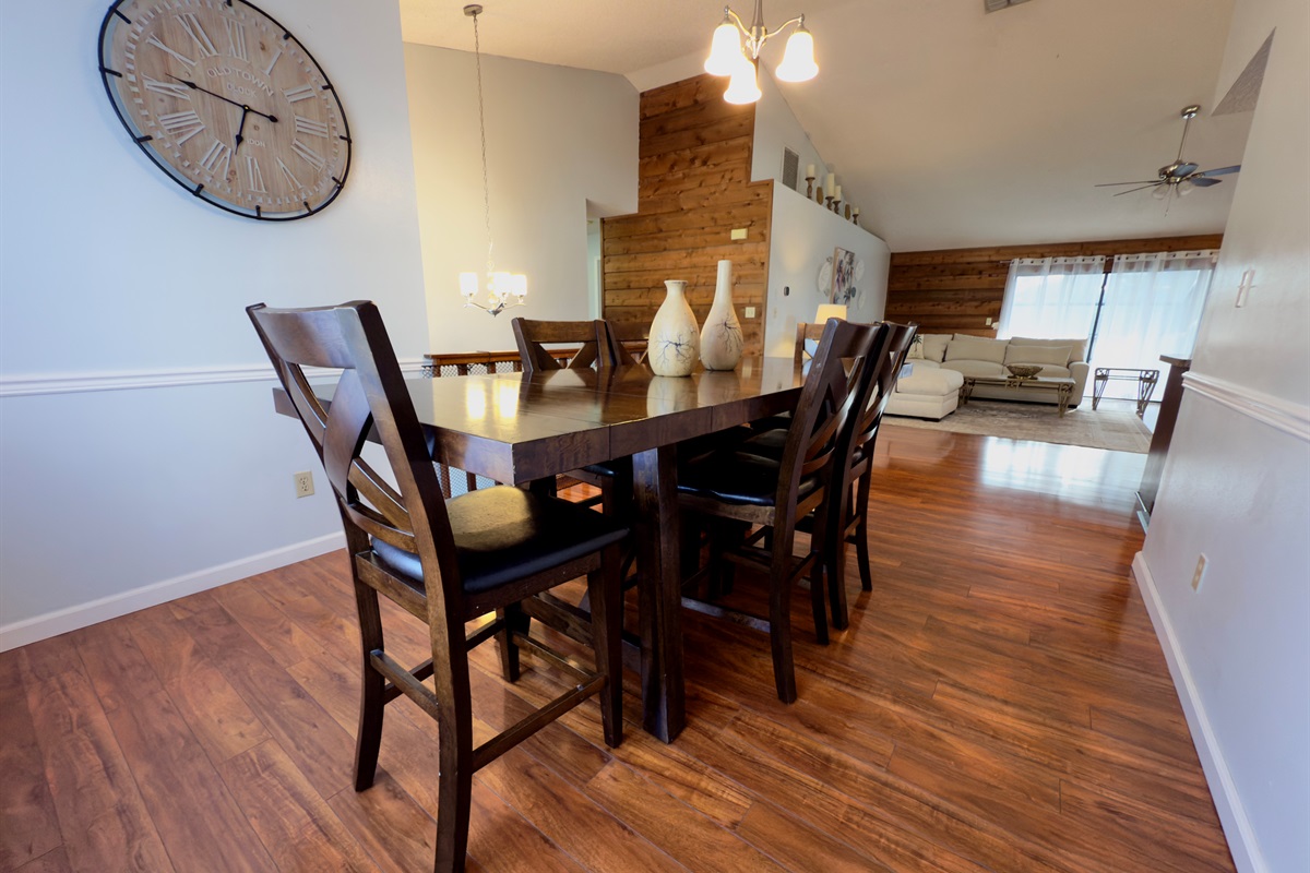 Set against a backdrop of warm wood floors and soft neutral tones, this space seamlessly blends rustic character with modern elegance.