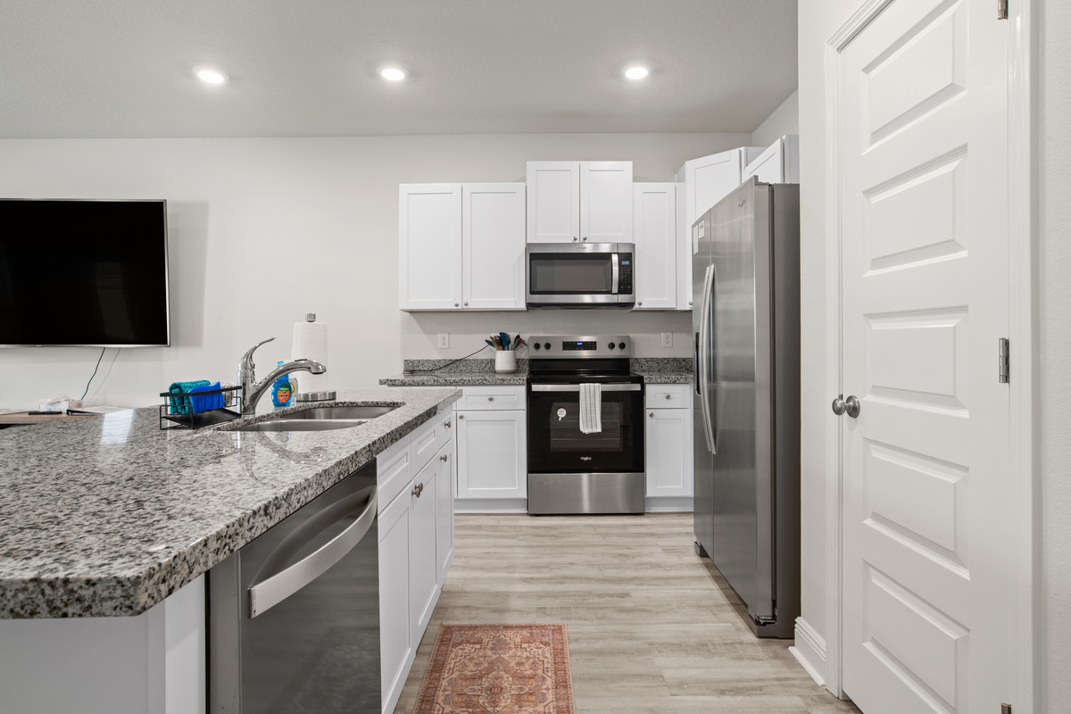 All new stainless fridge, dishwasher, stove and microwave.