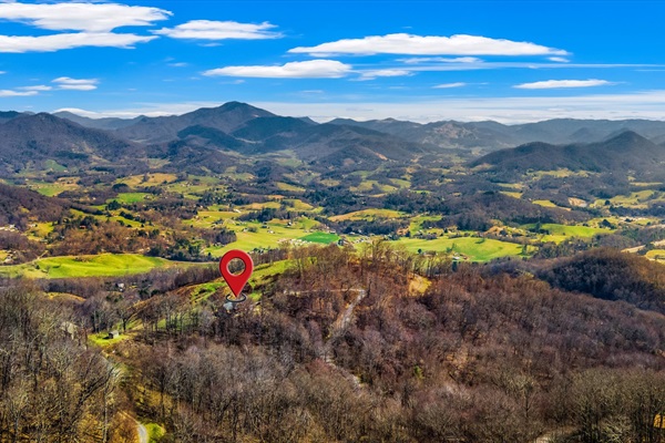 See where you’ll be staying—nestled in the mountains, with views and nature all around.