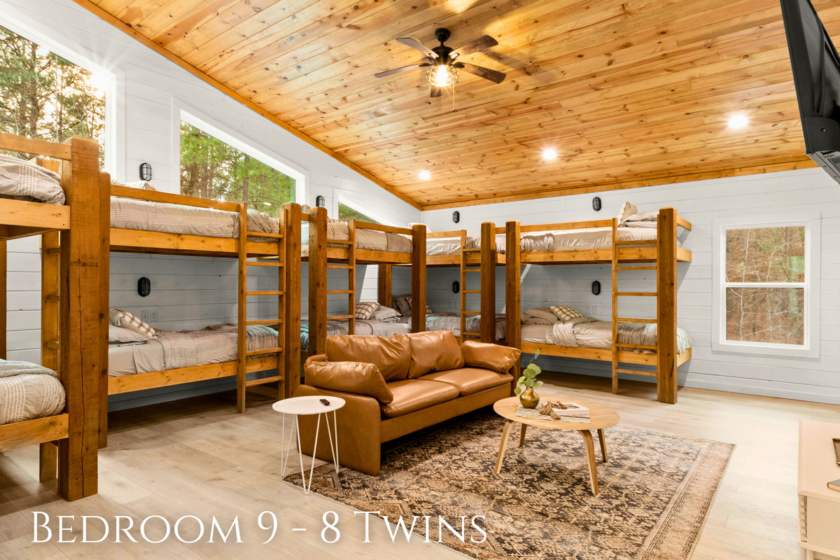 The space is well-utilized, with sturdy bunk beds that maximize sleeping areas, making it ideal for families or groups.