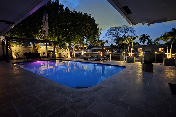 Beautiful evening waterfront setup with outdoor seating