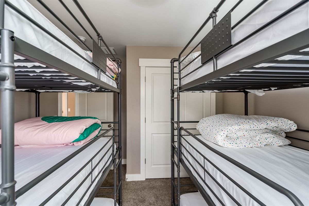 Ultimate bunk room with 6 twin beds—perfect for kids, friends, and fun