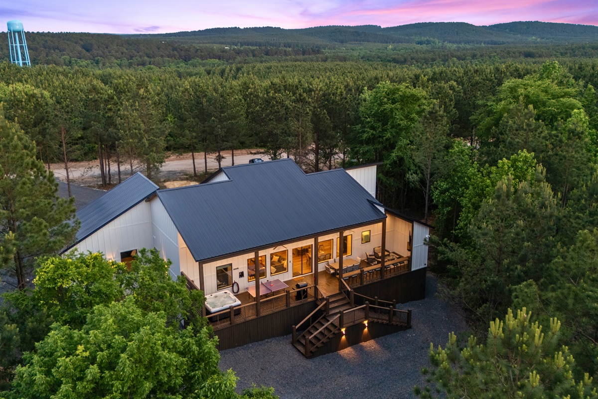 From above, you can truly appreciate the spacious outdoor areas, surrounding forest, and the sense of privacy that makes this cabin feel so relaxing.
