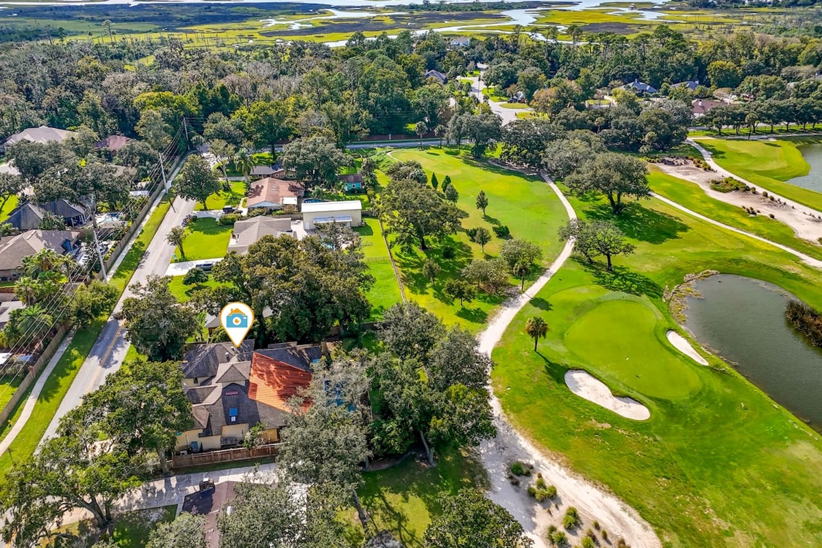 Arial view of the home next to the golf course