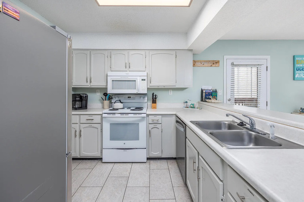 Full kitchen is fully stocked with everything you need
