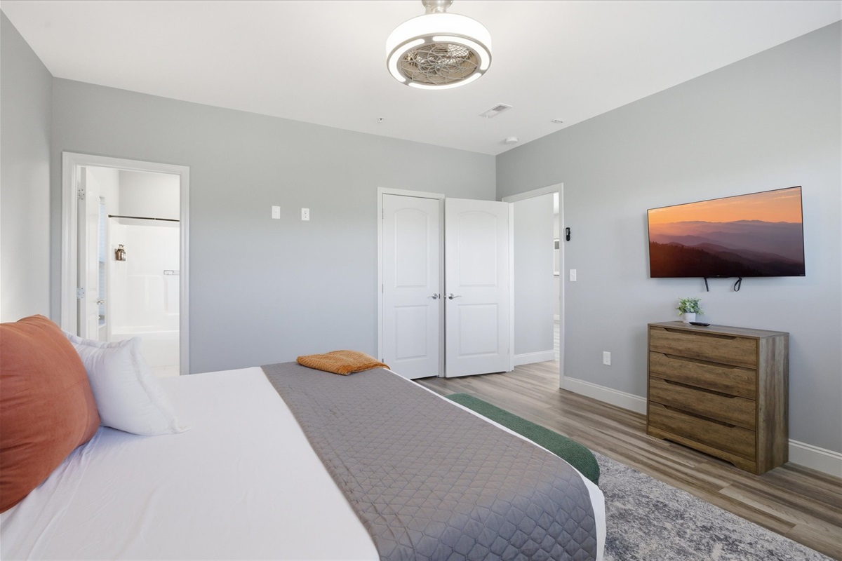 Settle into the king bed and take a break—Unit 3’s primary bedroom feels calm and tucked away, with a TV ready when you want to wind down on your own time.
