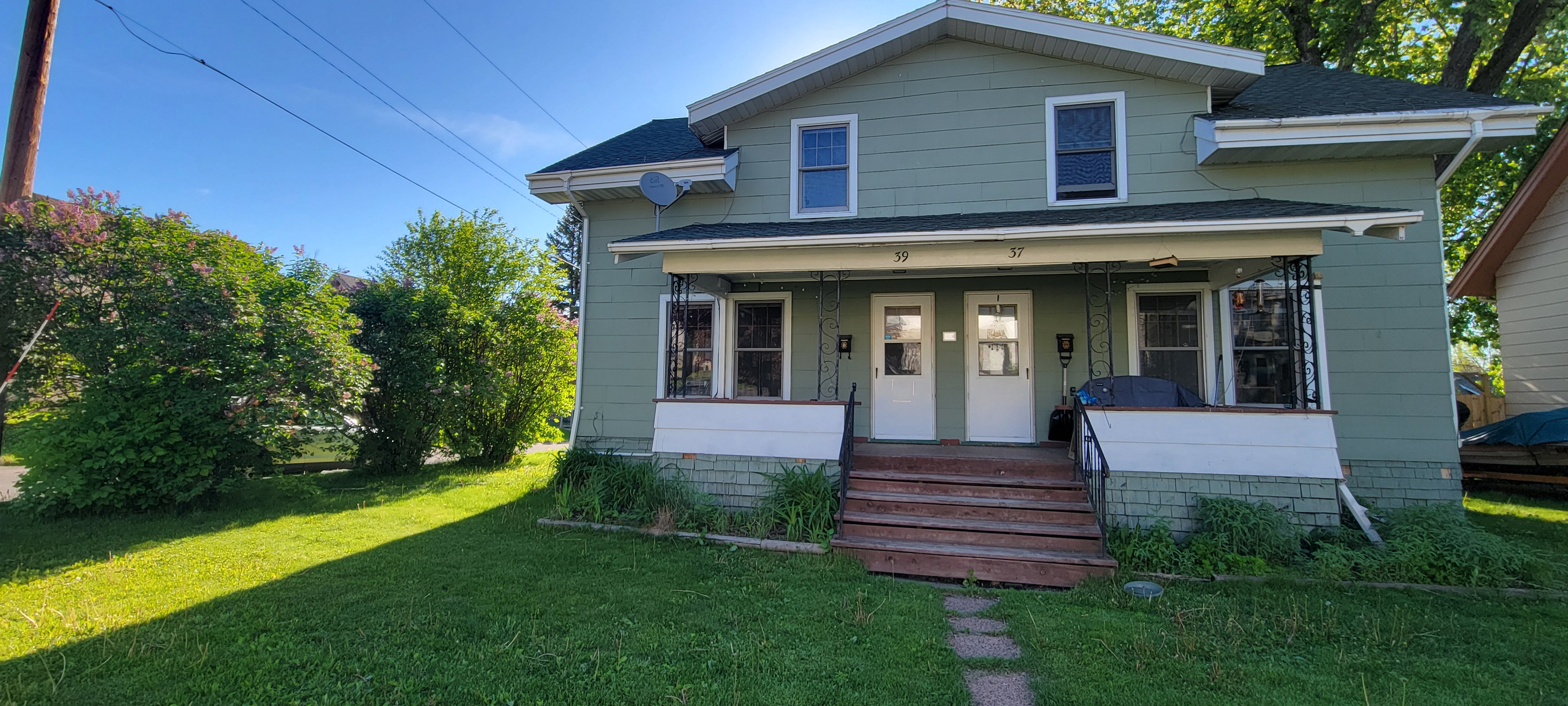 Front exterior of Loon Lookout, a cozy side-by-side townhome in Duluth’s Riverside neighborhood.