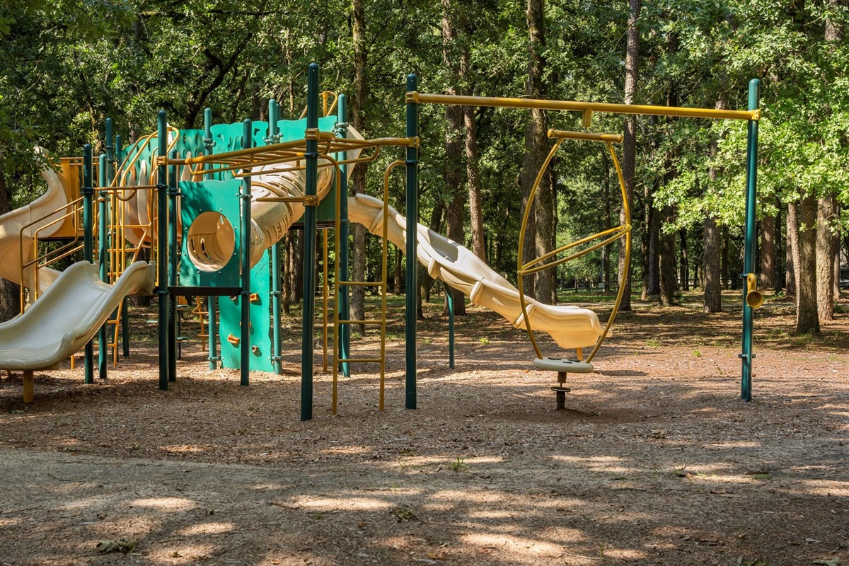 A fantastic playground just a block from home, surrounded by towering trees for shade. Featuring multiple slides, climbing structures, and interactive elements, it’s perfect for kids to play.