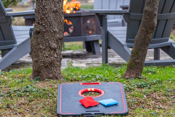 Start a cornhole match in the backyard — Hot Springs Breakaway
