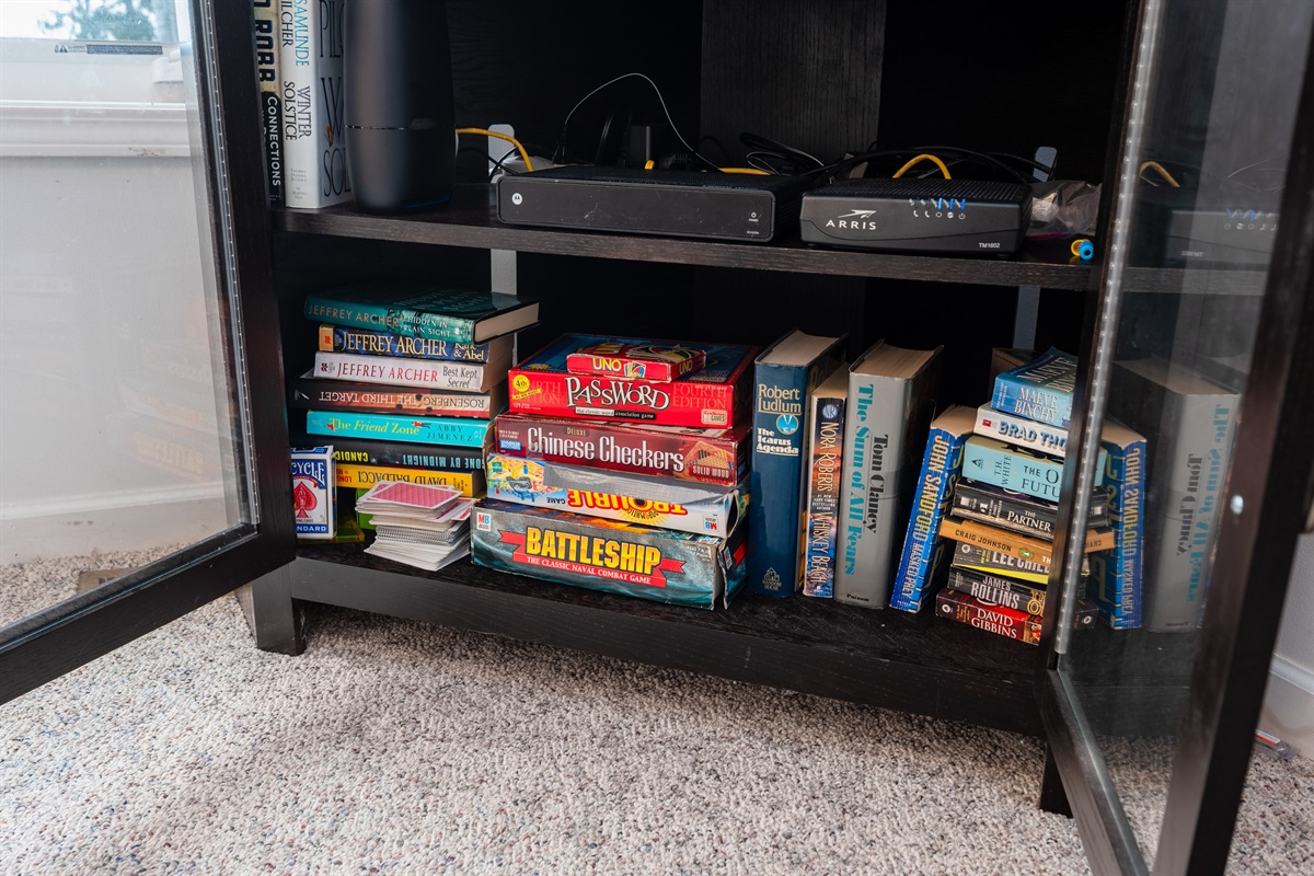 Game shelf stocked with board games