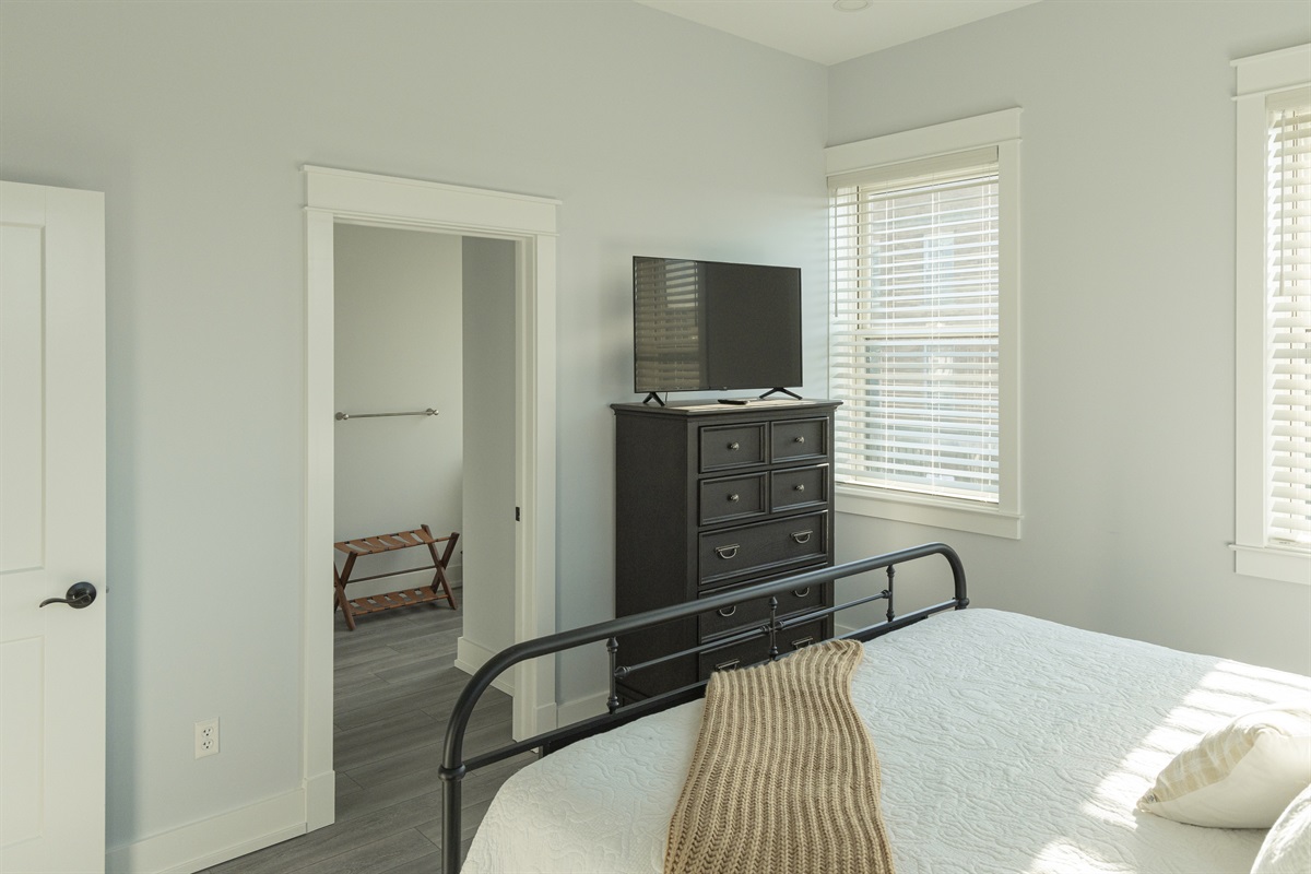 Master bedroom features king size bed, Smart TV