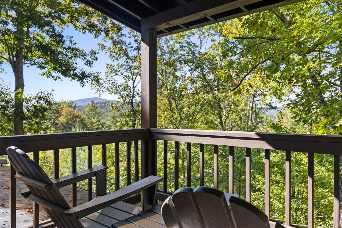 Relax in shaded comfort, the covered deck is perfect for lazy afternoons.