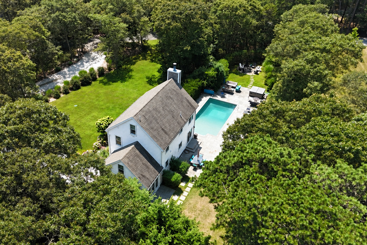 Aerial view of the house, pool and grounds