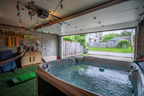 Unwind and enjoy the breeze. Open up the garage door on nice days to blend the indoor amenities with outdoor relaxation.