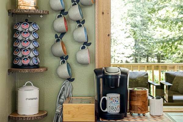 Our coffee bar is fully stocked with creamer, sugar, Keurig coffees, and teas.