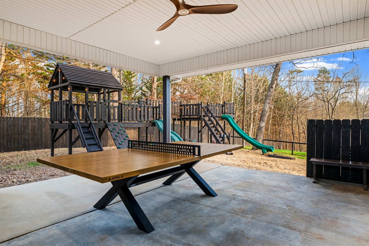 The covered outdoor area features an upscale ping pong table. It’s perfect for friendly competition, rain or shine.