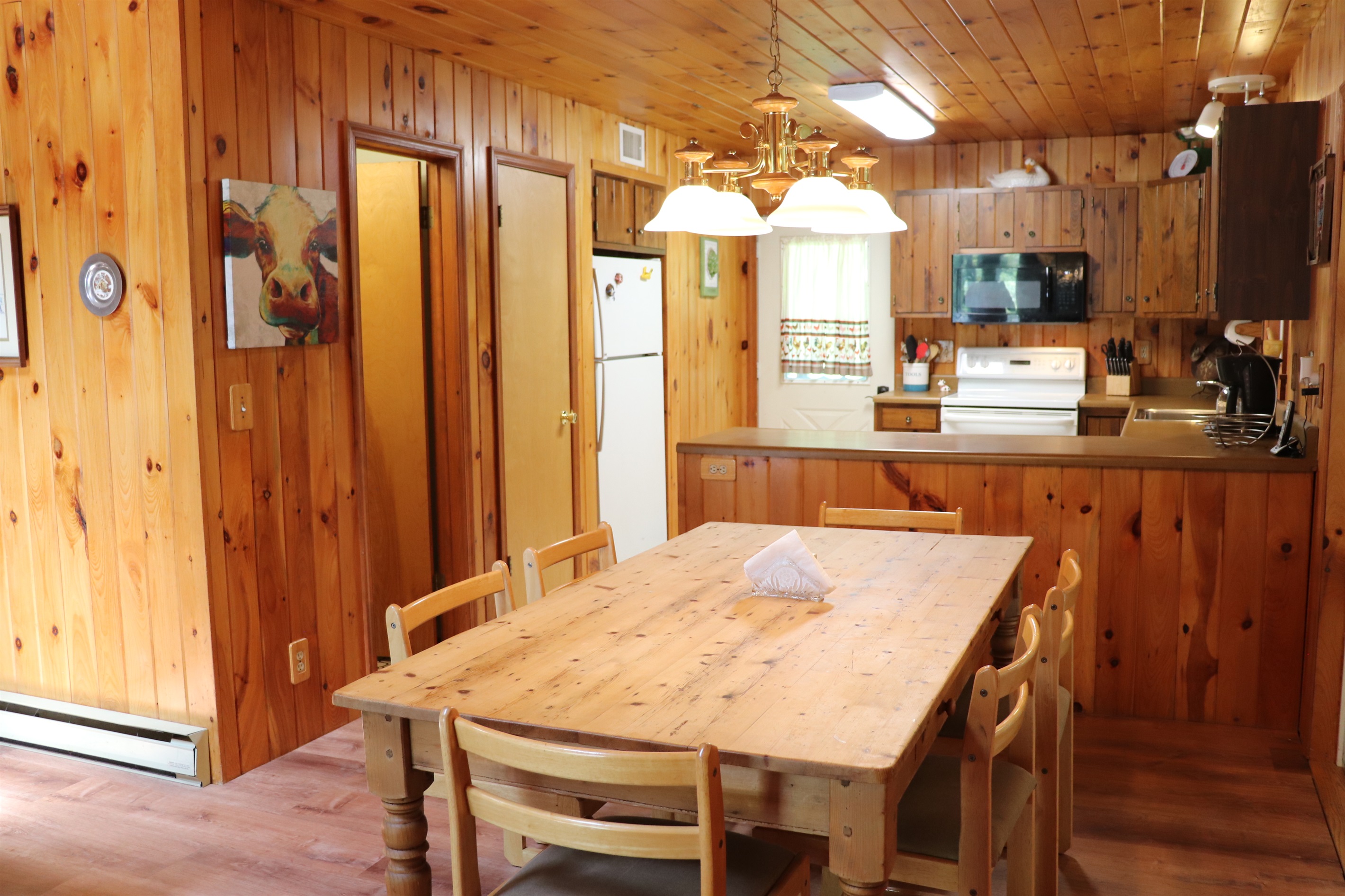 Dining table open into the kitchen/living room