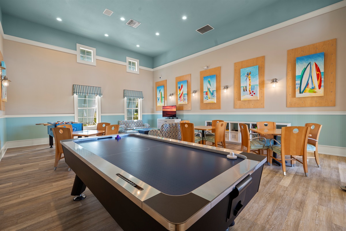 When the sun dips or the weather flips, drift into the game lounge for air-hockey showdowns, board-game laughs, and an easy movie on the couch—your crew together, still in flip-flops, reliving the day after dinner.
