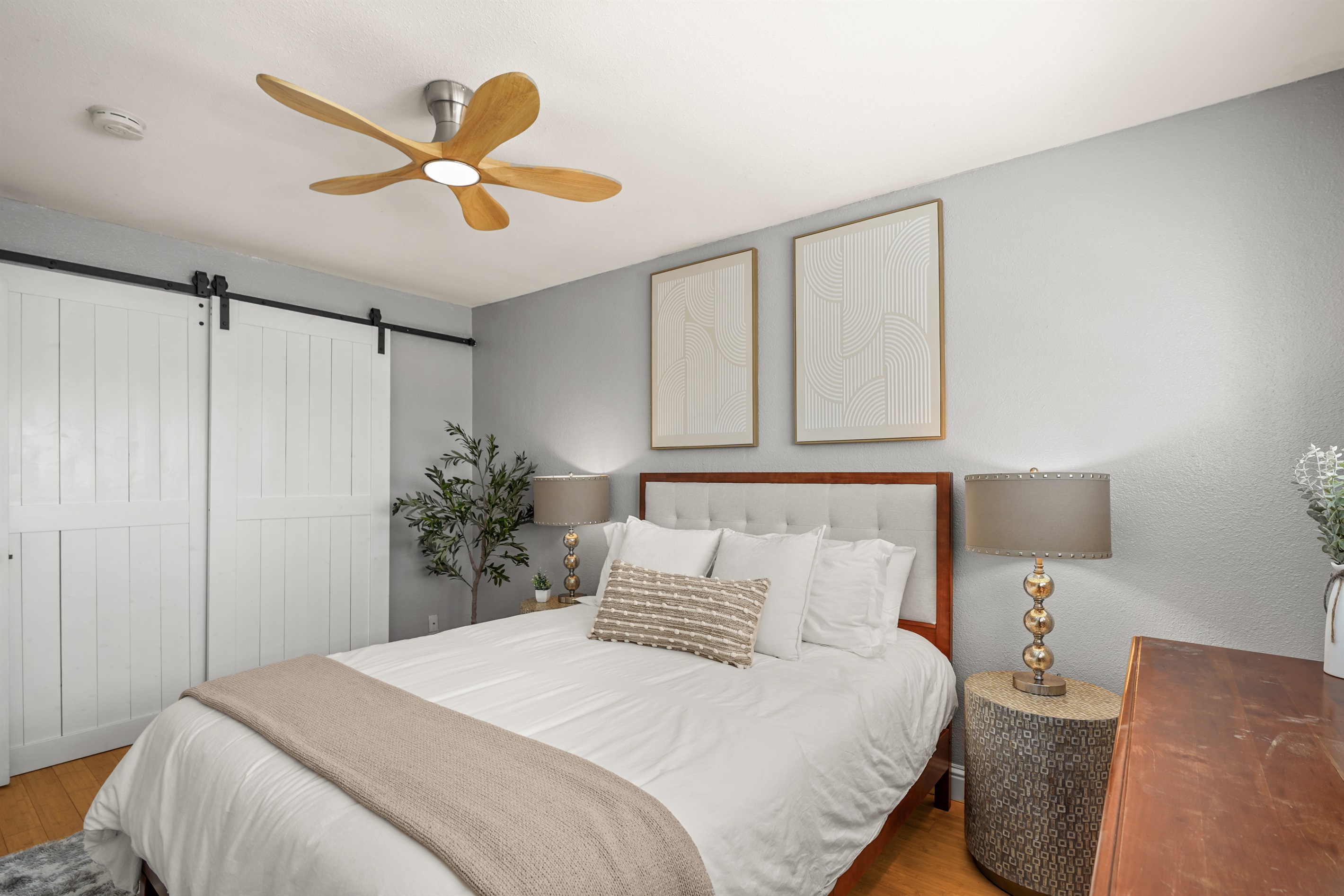 Cozy upstairs bedroom with a queen bed and relaxing atmosphere.