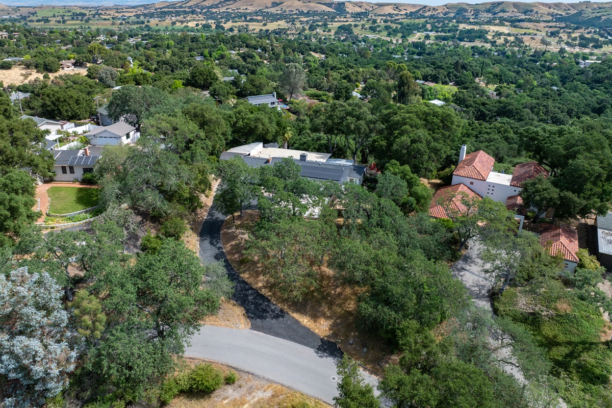 A peaceful escape surrounded by rolling hills and lush greenery.