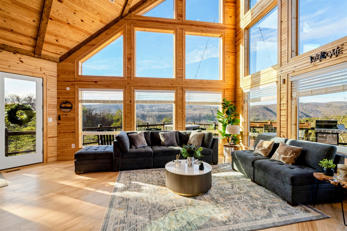Living Large – Bask in the sunlight and panoramic mountain views from the lodge’s soaring Great Room.