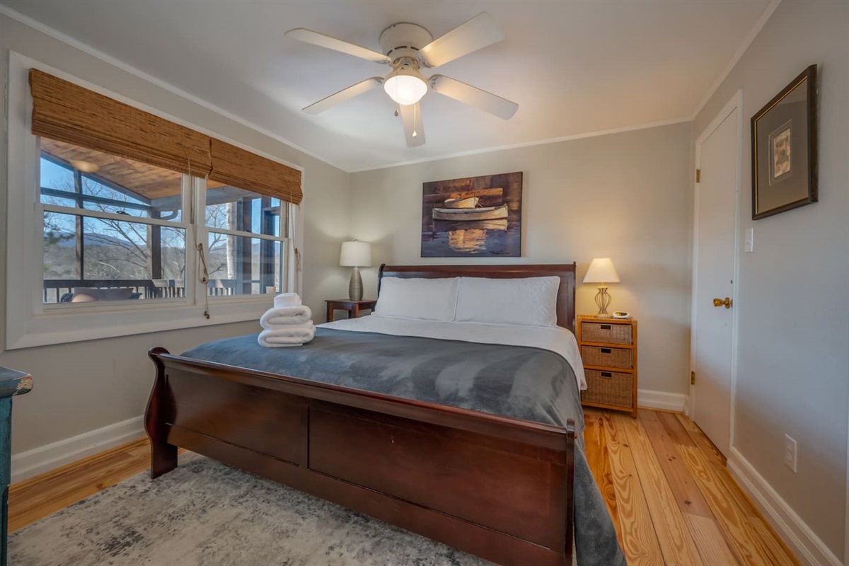 Primary bedroom with king bed and private full bathroom
Main level of cabin