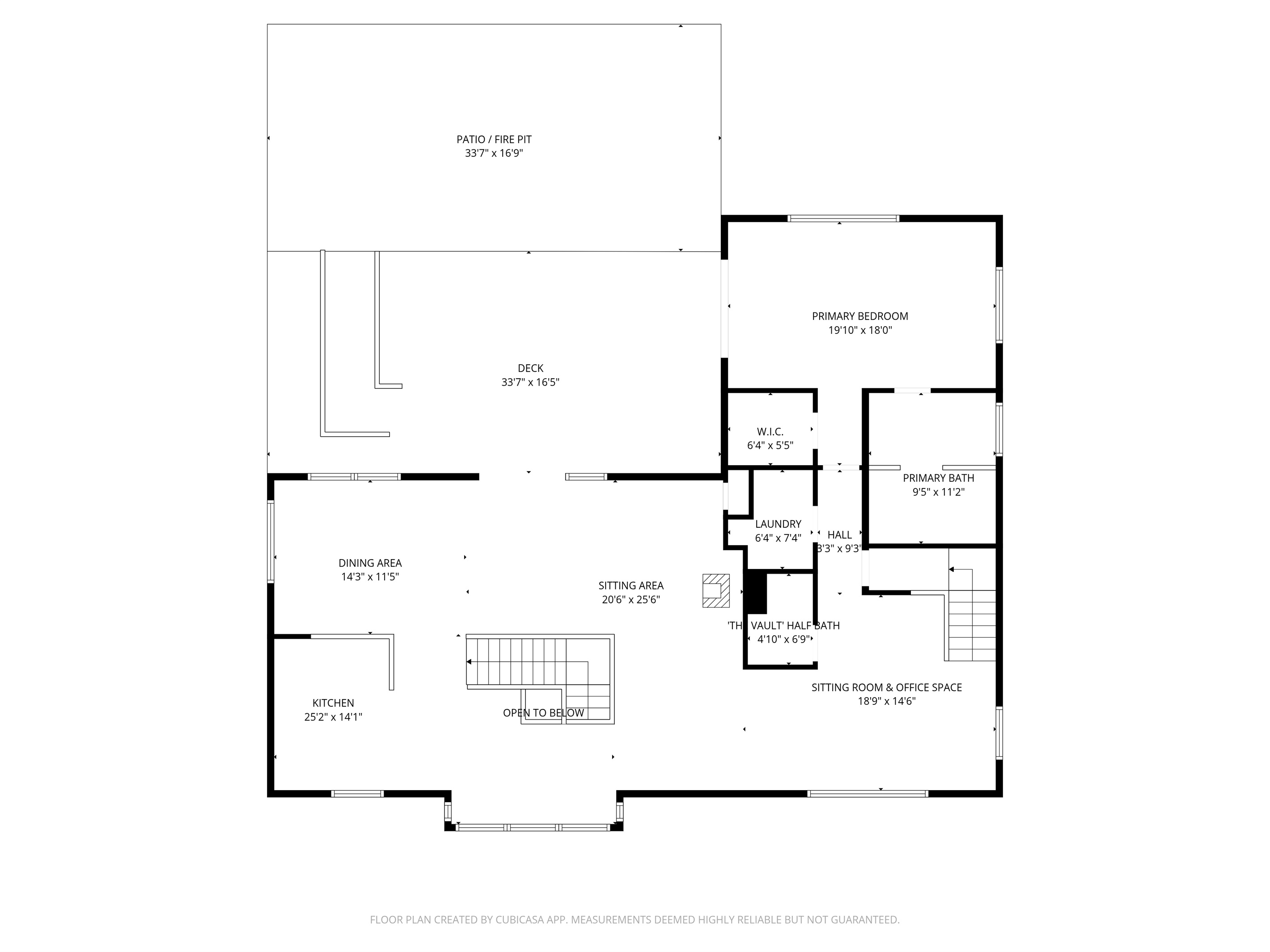 The main floor social heart. Open-concept gourmet kitchen, dining, and living areas flow out to the massive 33ft deck and stone fire pit. Includes the primary king suite wing, laundry, and the "Instagrammable" designer half-bath for group convenience.