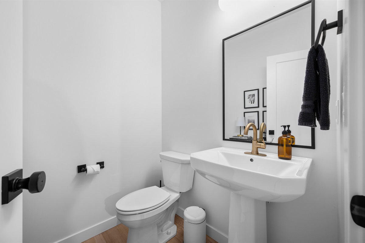 Stylish half bathroom with modern finishes.