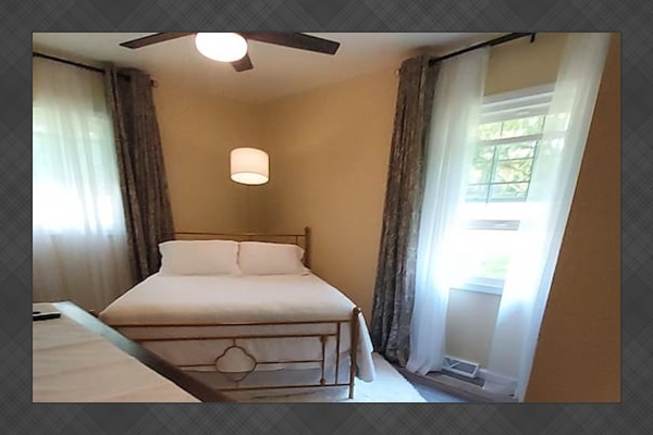 When the windows are open, a gentle country breeze fills the room.  It's so charming and peaceful, with lovely views and a quiet that invites relaxation. A remote-controlled fan and lamp help you set just the right mood.