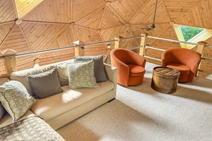 Small Indoor living with couch and 2 armchairs